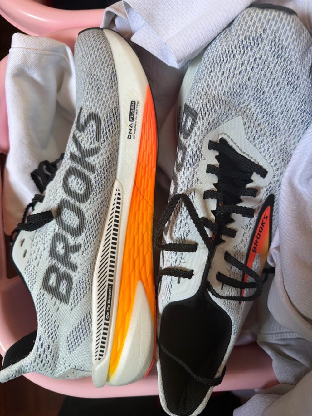 Brooks White and Black Running Shoes with Orange Midsole Accent